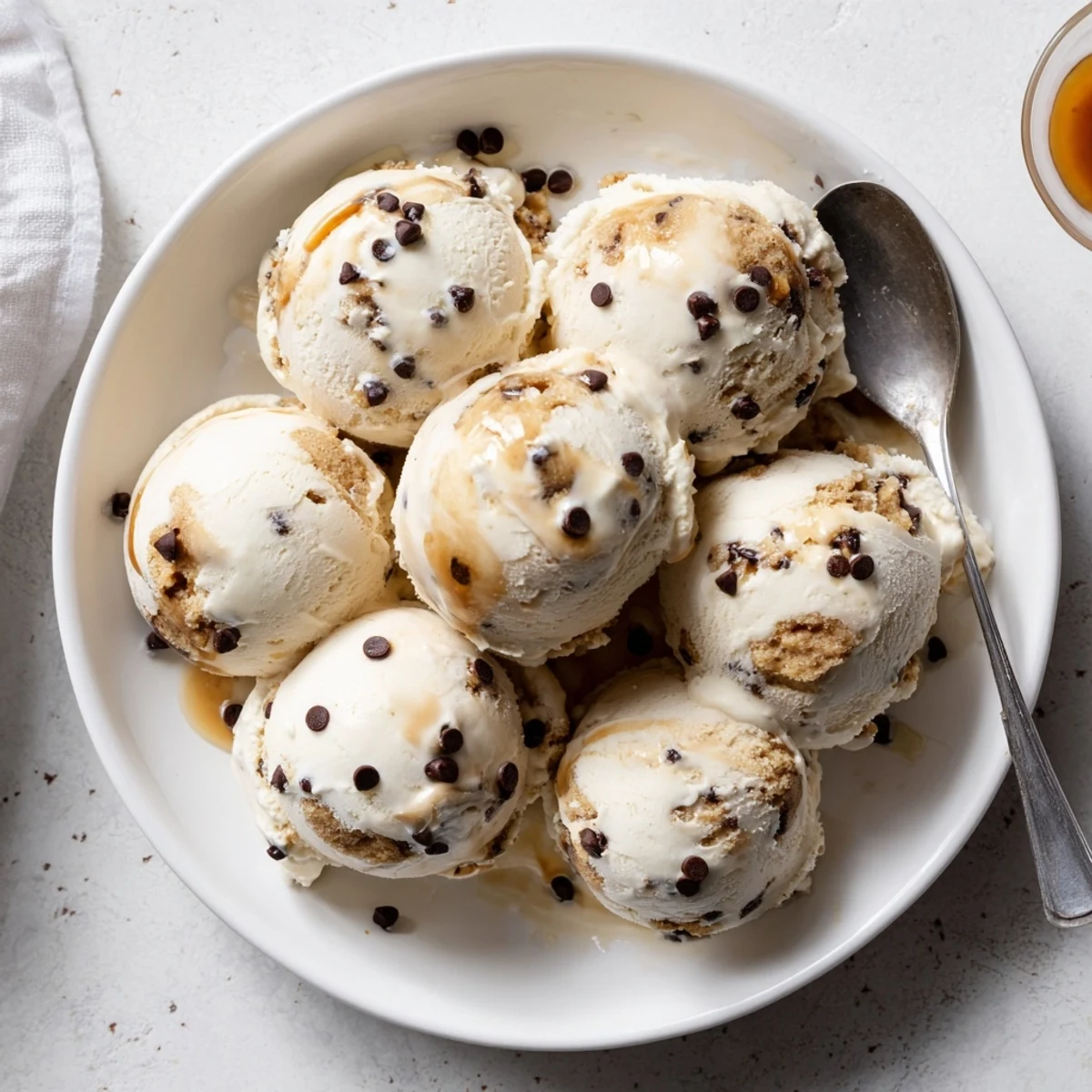 Indulge in fluffy Cottage Cheese Ice Cream, featuring sweet cookie dough pieces throughout.