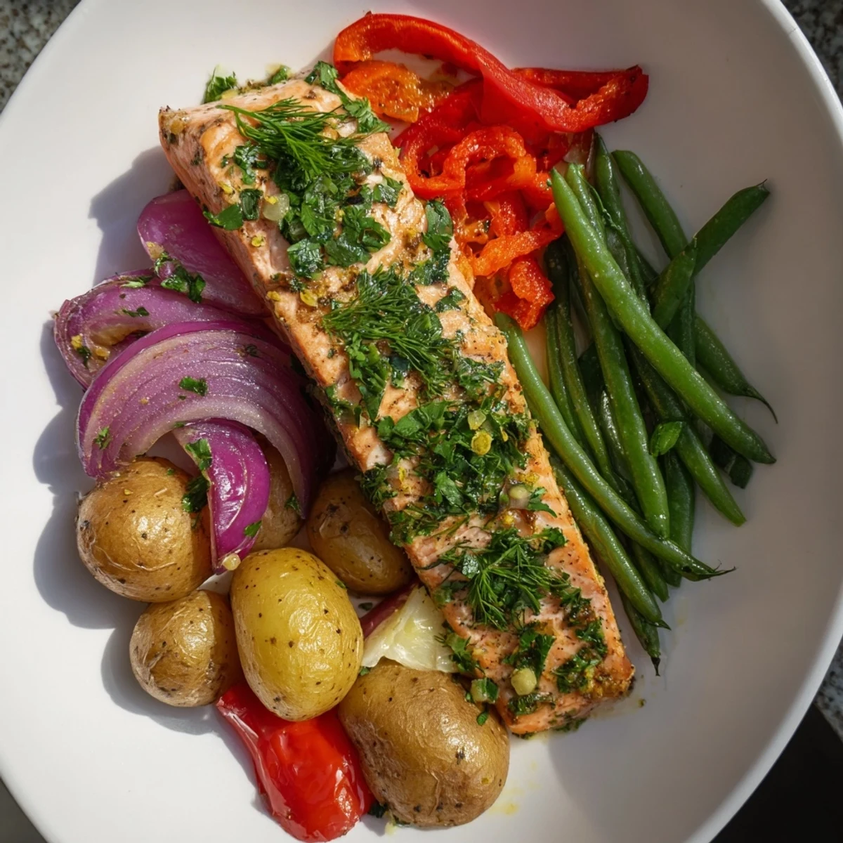 Bright and flavorful sheet pan, with perfectly cooked Lemon Herb Salmon and vibrant veggies.
