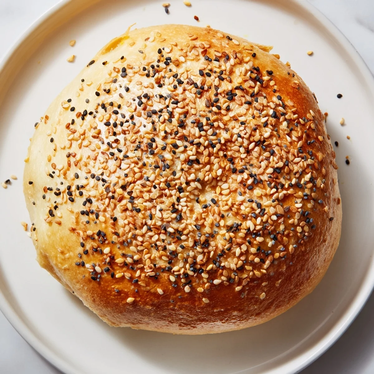 A close-up of chewy homemade budget bagels, boiled and baked to perfection for a delicious breakfast.