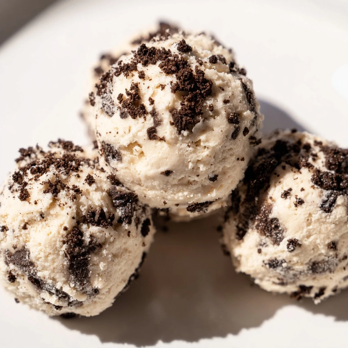 Cream Cheese Oreo Protein Balls displayed with visible Oreo crumbs offering a sweet, creamy treat.