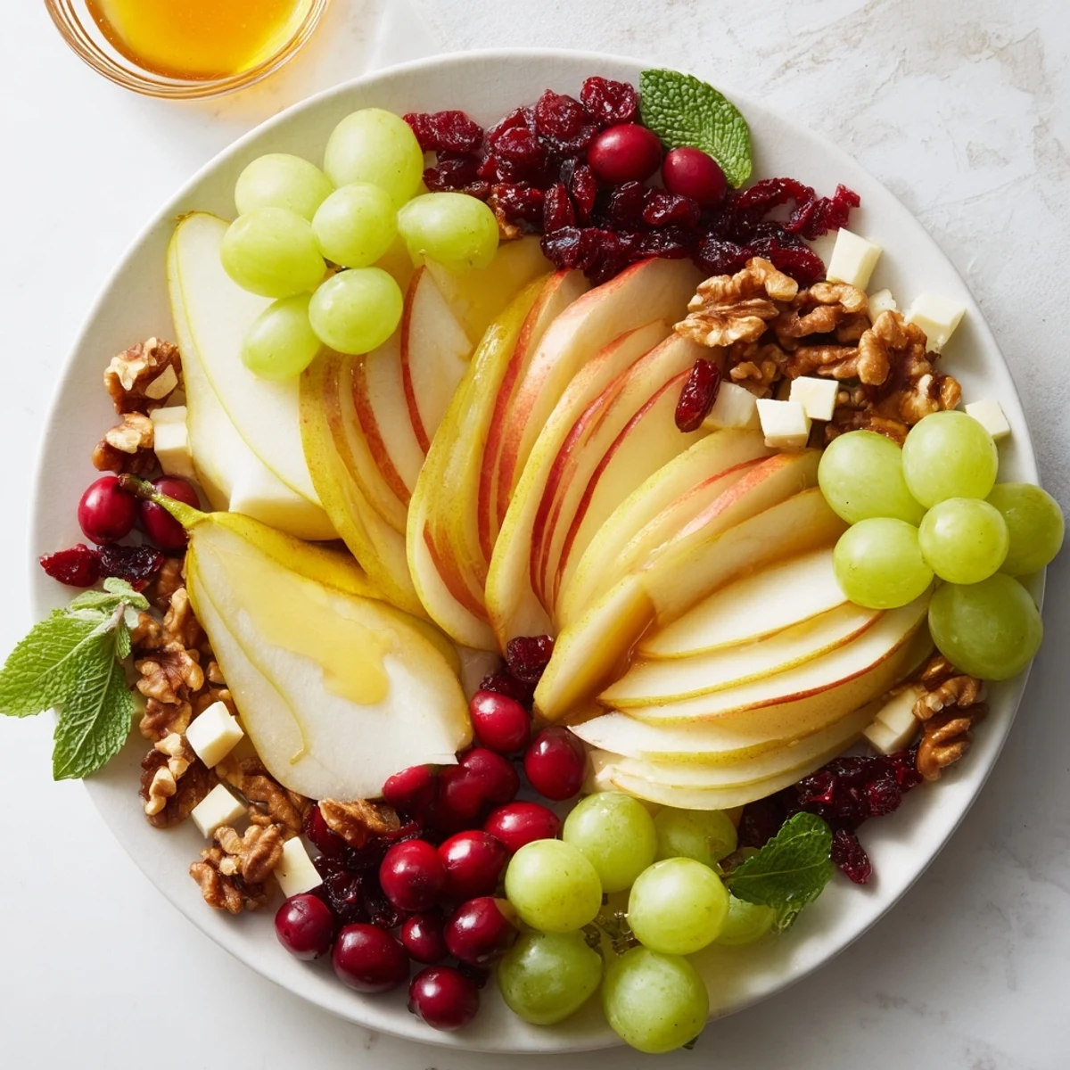 Vibrant Apple Orchard Fruit Board with crisp apple slices, grapes, and cheddar cheese, perfect for snacking.
