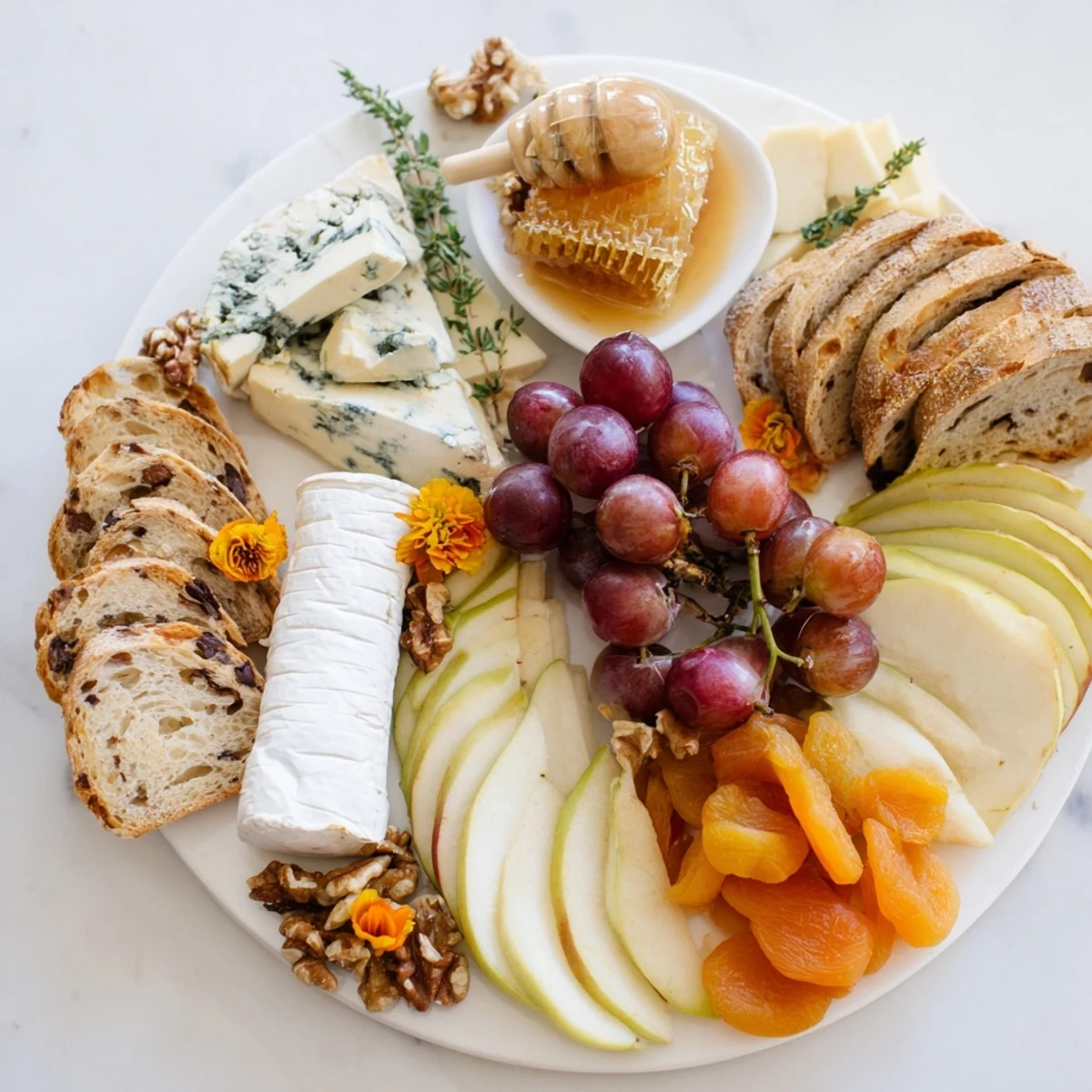 Honeycomb, Honey & Cheese Board with creamy Brie and blue cheese ready to serve.
