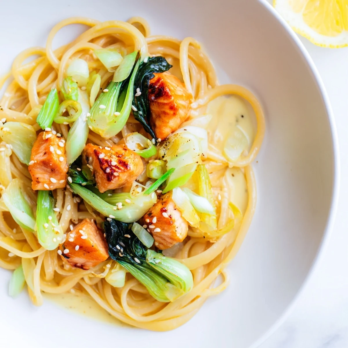 Creamy Miso Butter Salmon Pasta: a delicious close-up showcases tender salmon and perfectly cooked pasta.