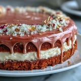 A stunning Bridal Shower Rosé Velvet Cake with Gold Drip: Delicate layers of pink velvet cake paired with creamy rosé buttercream and gold accents.