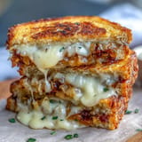 Savory Fermented Cabbage Grilled Cheese oozing with melted Swiss and sharp cheddar.