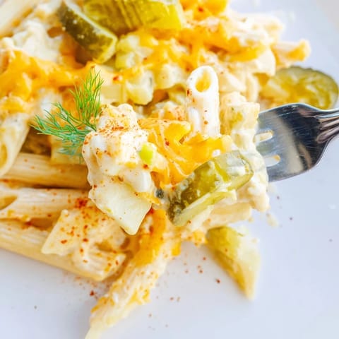 Satisfy your cravings with cheesy Pickle and Cheddar Loaded Potato Pasta dish.  