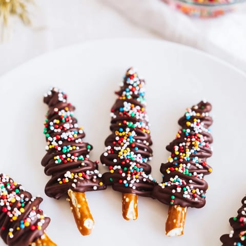 Melted chocolate turns into delightful Express Chocolate Christmas Trees, ready for holiday celebrations and gifting!