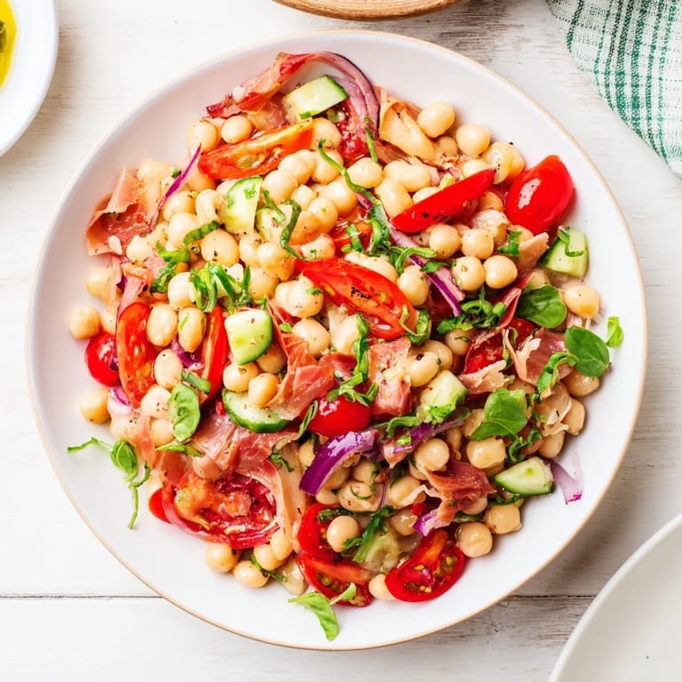 This chilled Dense Bean Salad with Prosciutto offers a delightful mix of flavors and textures in every bite.